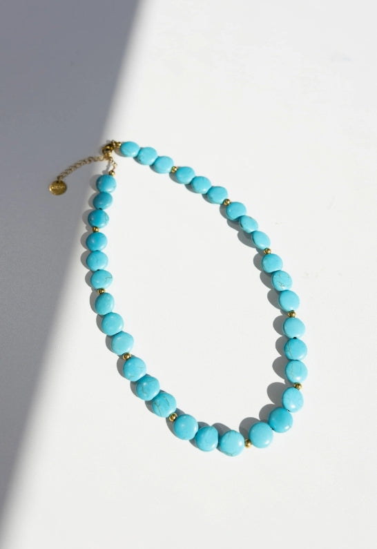 This turquoise necklace blends natural beauty with a touch of gold, creating an effortless statement piece that brings serenity and style to your day. Made to last, it’s waterproof, tarnish resistant, and hypoallergenic for everyday wear.