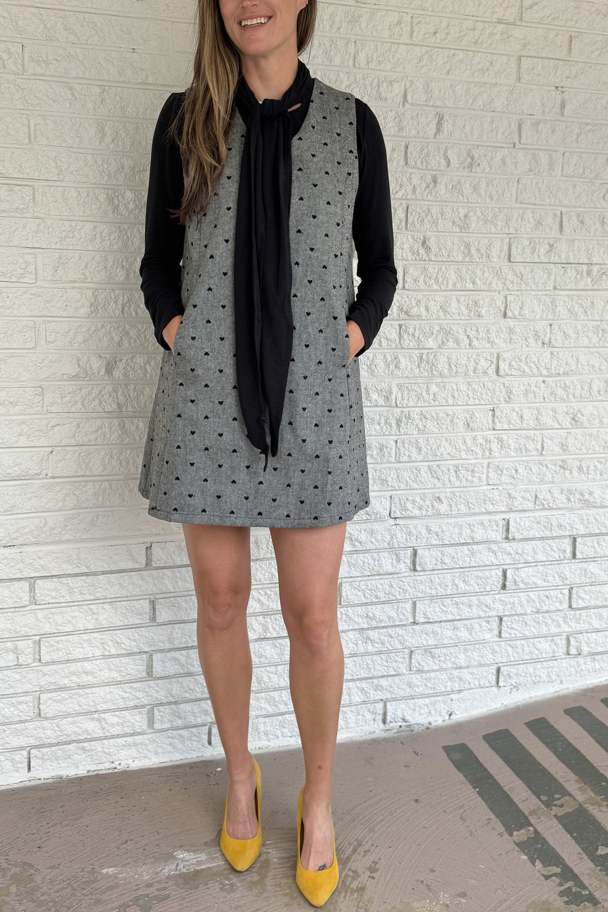Designed in Spain, this timeless shift dress is a modern take on classic style. Fully lined and finished with subtle textured details, it’s an easy piece to layer through the seasons. Pair it with a blouse or turtleneck for an effortlessly polished look that works from day to night.