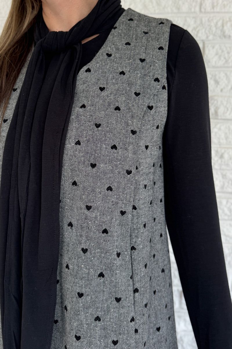 Designed in Spain, this timeless shift dress is a modern take on classic style. Fully lined and finished with subtle textured details, it’s an easy piece to layer through the seasons. Pair it with a blouse or turtleneck for an effortlessly polished look that works from day to night.