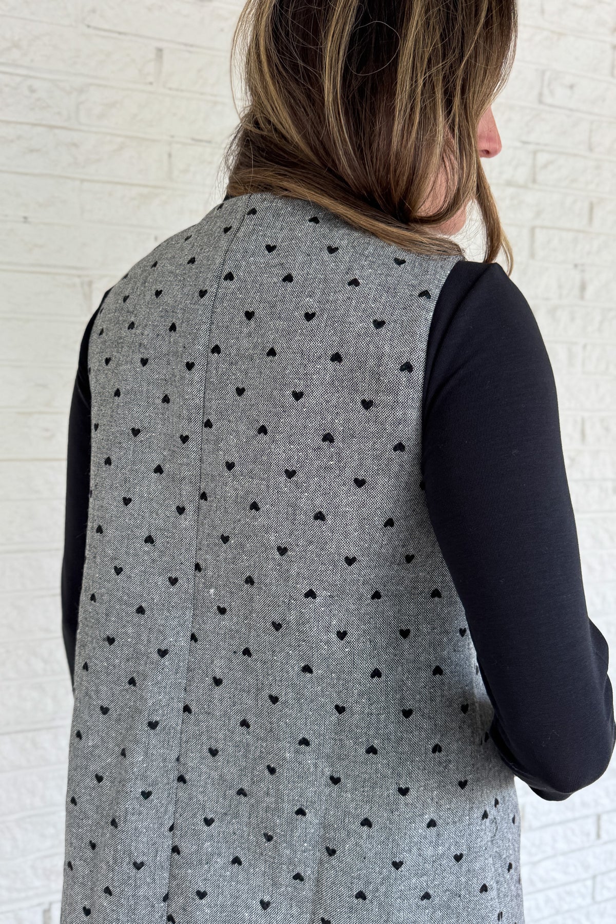 Designed in Spain, this timeless shift dress is a modern take on classic style. Fully lined and finished with subtle textured details, it’s an easy piece to layer through the seasons. Pair it with a blouse or turtleneck for an effortlessly polished look that works from day to night.