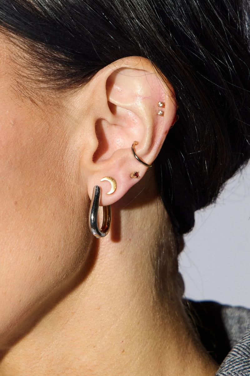 two tone huggie earrings, mixed metal earrings, waterproof earrings, PVD plated jewelry, nickel free earrings, hypoallergenic earrings, huggie hoop earrings, small hoop earrings, everyday earrings, modern earrings, women’s fashion jewelry, boutique earrings, effortless style jewelry, gold silver earrings, trendy women’s accessories, Cotton & Cashmere boutique, Blanco Texas boutique, women’s jewelry online