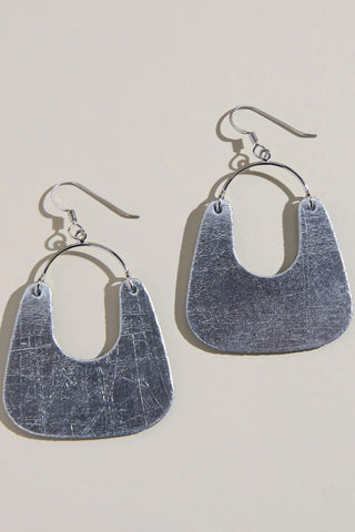 silver statement earrings, leather statement earrings, vintage silver earrings, lightweight earrings, modern silhouette earrings, sterling silver ear wire earrings, nickel free earrings, boutique jewelry, women’s fashion jewelry, statement earrings for women, effortless style accessories, silver drop earrings, chic everyday earrings, unique leather earrings, Cotton & Cashmere boutique, Blanco Texas boutique, women’s jewelry online, modern women’s accessories