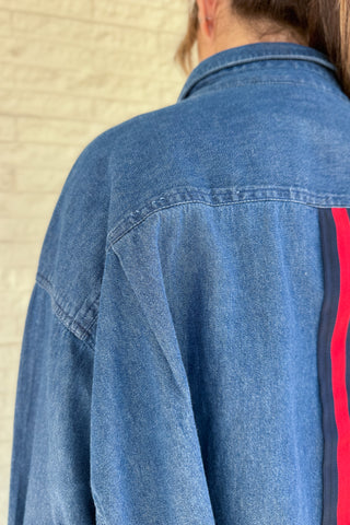 An upcycled men’s shirt reworked into a cropped, raw hem, easy silhouette that feels fresh and relaxed. Soft, classic, and one-of-a-kind. Designed to be a one size fits most, wear it buttoned up and it fits like medium or large Women's fashion boutique Blanco Texas Johnson City Texas