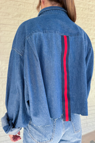 An upcycled men’s shirt reworked into a cropped, raw hem, easy silhouette that feels fresh and relaxed. Soft, classic, and one-of-a-kind. Designed to be a one size fits most, wear it buttoned up and it fits like medium or large. Women's fashion boutique Blanco Texas Johnson City Texas