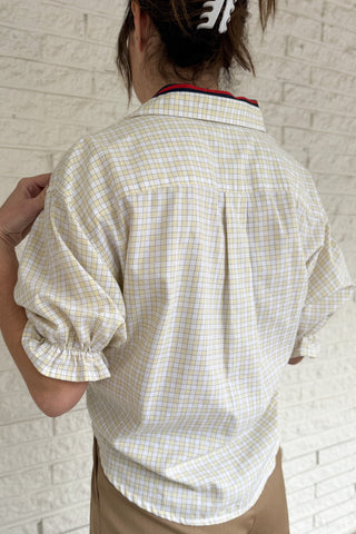 An upcycled men’s shirt reworked into a cropped, finished hem, easy silhouette that feels fresh and relaxed. Soft, breathable, and one-of-a-kind. Designed to be a one size fits most, this blouse fits sizes small to large. Women's fashion boutique Blanco Texas