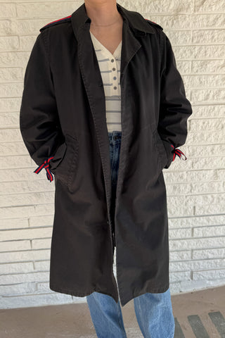 The Von Jacket by Vonvie is a one of a kind upcycled men’s jacket reworked for everyday wear. This piece blends classic structure with unique, thoughtful details for a look that feels effortless but elevated. Designed to layer easily, it features a removable fur lining for versatile wear through changing seasons. Grosgrain ribbon accents at the cuffs add a subtle pop of contrast and an unexpected design detail that sets this jacket apart. Women's fashion boutique Blanco Texas