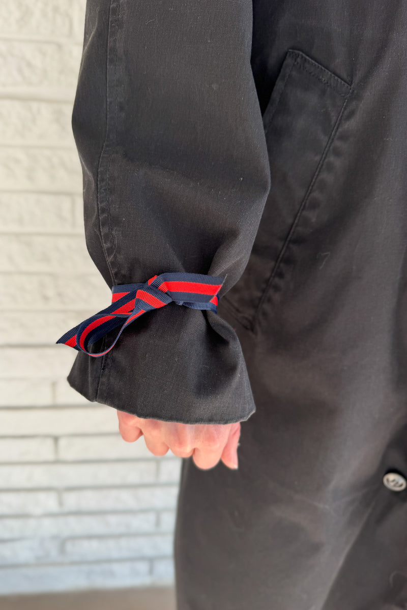 The Von Jacket by Vonvie is a one of a kind upcycled men’s jacket reworked for everyday wear. This piece blends classic structure with unique, thoughtful details for a look that feels effortless but elevated. Designed to layer easily, it features a removable fur lining for versatile wear through changing seasons. Grosgrain ribbon accents at the cuffs add a subtle pop of contrast and an unexpected design detail that sets this jacket apart. Women's fashion boutique Blanco Texas