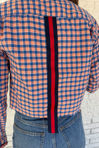 An upcycled men’s shirt reworked into a cropped, raw hem, easy silhouette that feels fresh and relaxed. Soft, feminine, and one-of-a-kind. Designed to be a one size fits most when worn open, wear it buttoned up and it fits like small or medium.An upcycled men’s shirt reworked into a cropped, raw hem, easy silhouette that feels fresh and relaxed. Soft, feminine, and one-of-a-kind. Women's fashion boutique Blanco Texas Johnson City Texas