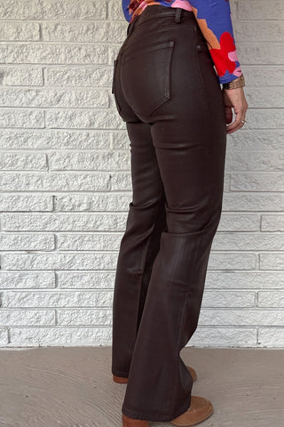 Habitual women's brown coated denim jeans with a smooth wax finish, flattering high waist, and classic five-pocket styling.