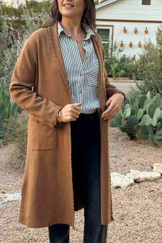 &nbsp;This long line cardigan with whipstitch detail adds a polished layer to any outfit. Soft and medium weight, it drapes beautifully while the whipstitch edging gives it a subtle, elevated touch.