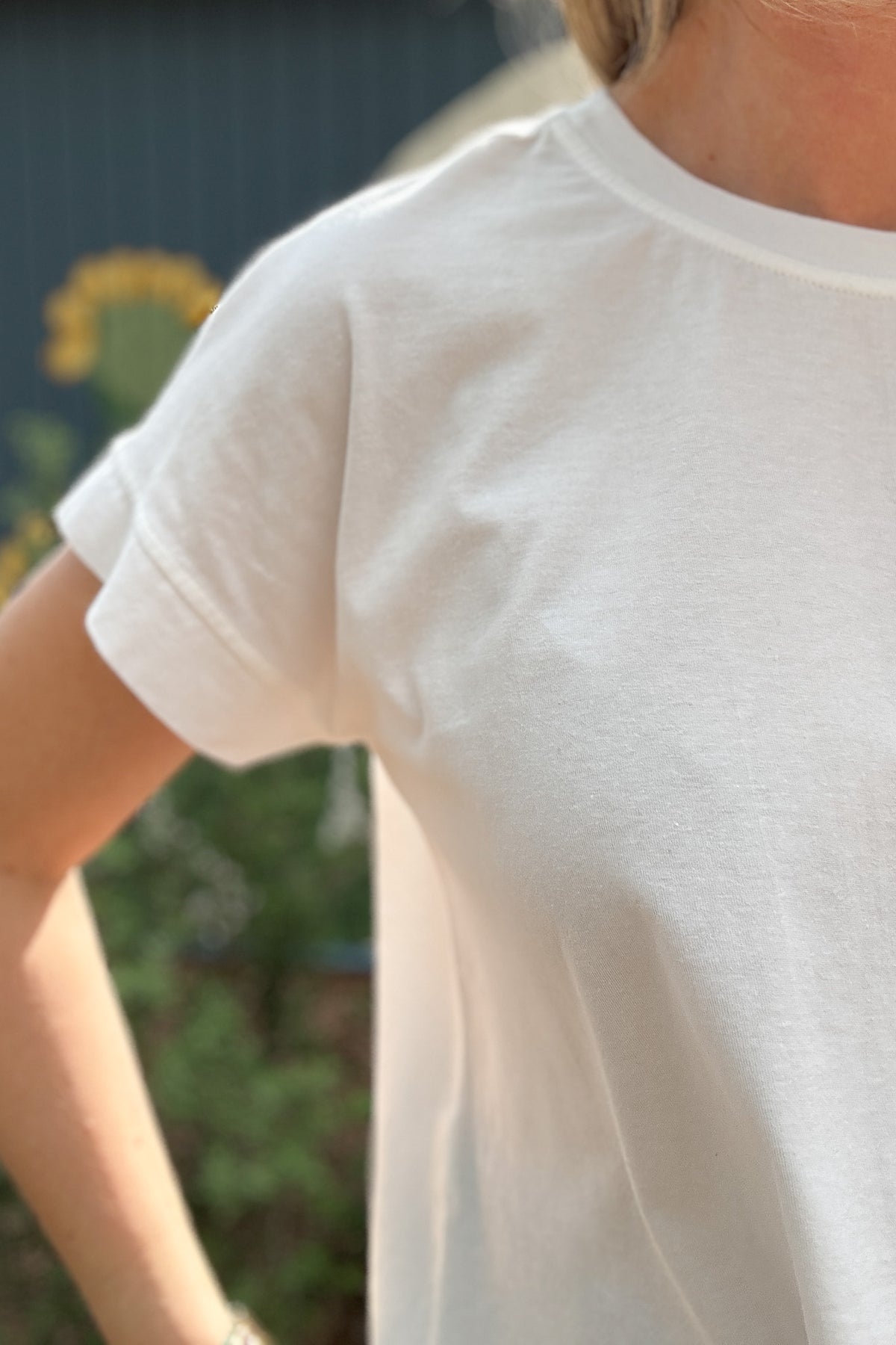 white cotton tee, women’s cotton clothing, cotton clothing, boxy tee, cap sleeve tee, effortless style, everyday style, sustainable women’s fashion, made in USA clothing, quality women’s clothing, clothing store near me, women’s clothing near me, Blanco TX boutique, Cotton and Cashmere 