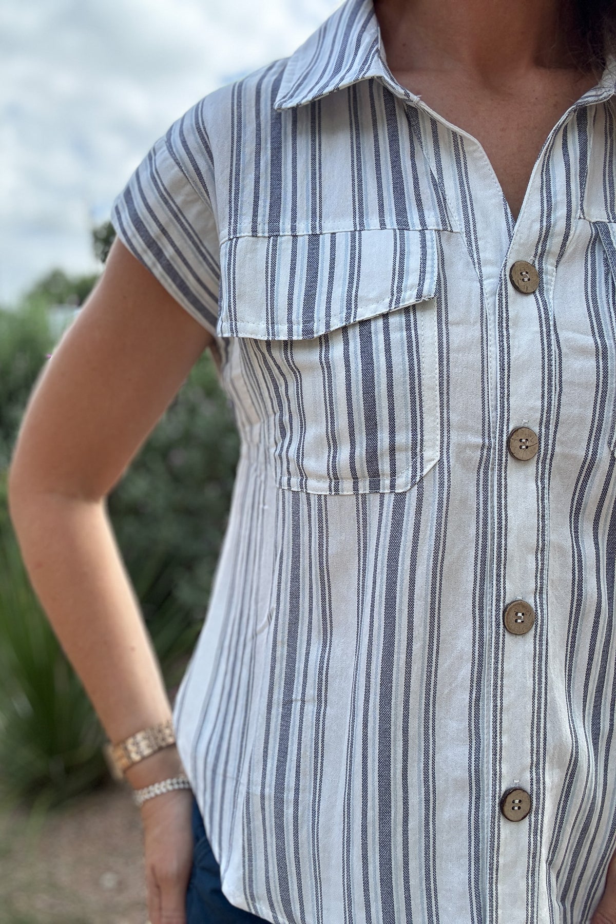 striped button up top
women’s striped shirt
blue and white striped top
casual button up shirt
short sleeve button up top
women’s everyday tops
collared striped shirt
boutique tops for women
effortless style boutique
Cotton and Cashmere Blanco Texas
women’s clothing boutique Blanco TX
casual summer tops
easy women’s fashion
Blanco Texas boutique shopping
women’s fashion Blanco TX