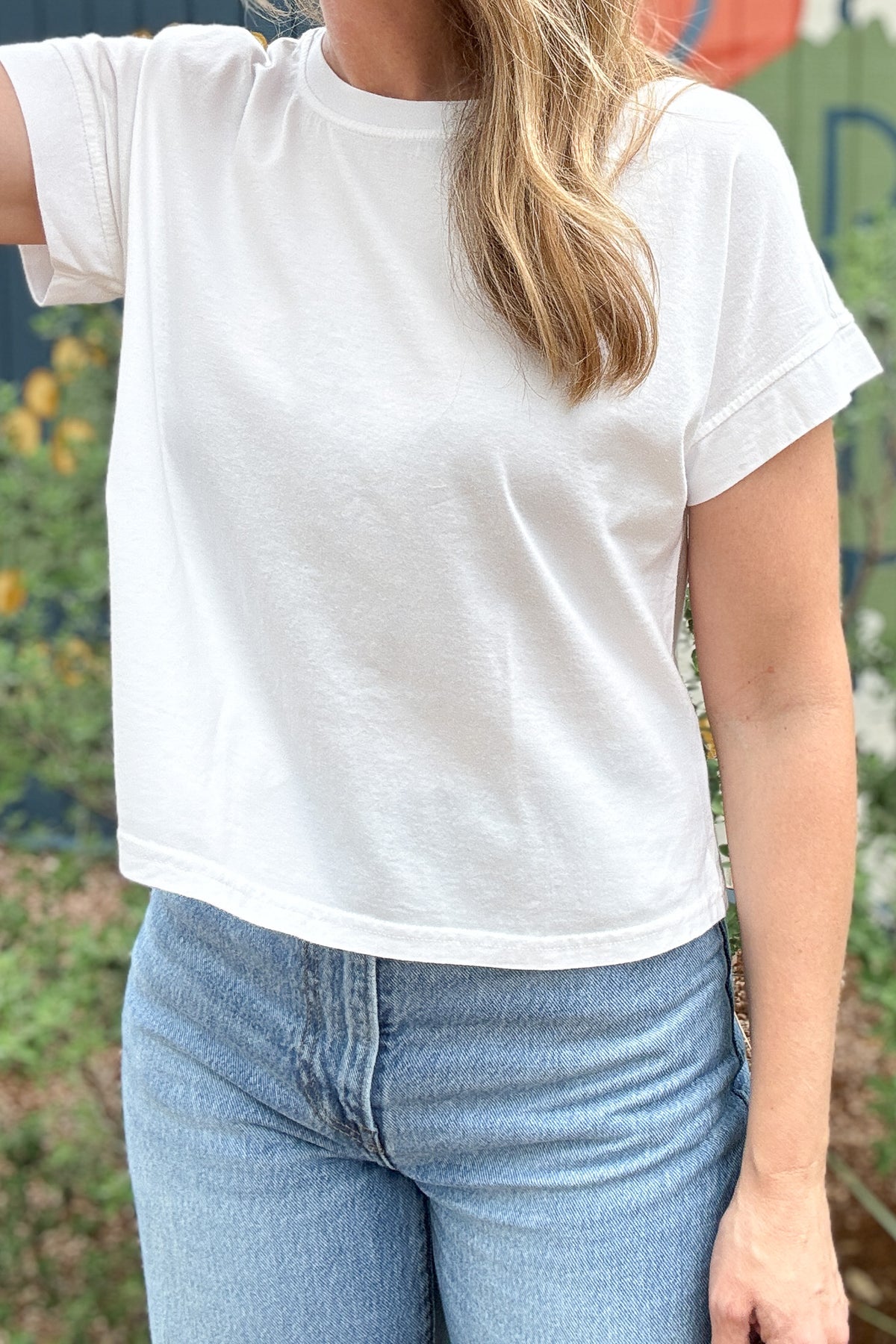 white cotton tee, women’s cotton clothing, cotton clothing, boxy tee, cap sleeve tee, effortless style, everyday style, sustainable women’s fashion, made in USA clothing, quality women’s clothing, clothing store near me, women’s clothing near me, Blanco TX boutique, Cotton and Cashmere 